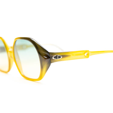 The logo of the Dior Orange & Dark Green Sunglasses.