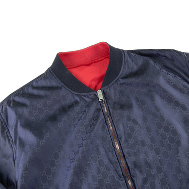 The collar of the Gucci Monogram Reversible Bomber.