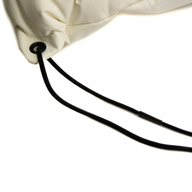 The drawstring of the Maison Margiela Glam Slam Drawstring Backpack.