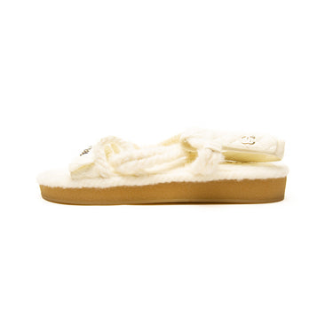 The left of the Chanel Cord Lambskin Quilted Sandals.