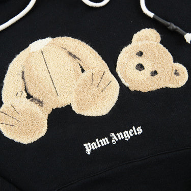 The logo of the Palm Angels Kill The Bear Black Hoodie.