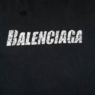 The logo of the Balenciaga Distressed Logo Black T Shirt.