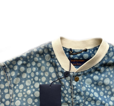 The collar of the Louis Vuitton X Yayoi Kusama Blue Dot Baseball Shirt.