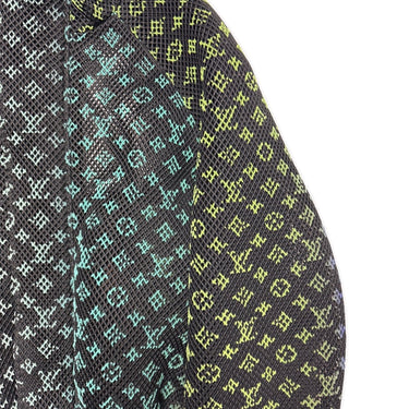 The logo of the Louis Vuitton Rainbow Gradient Mesh Bomber Jacket.