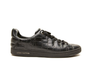 The right of the Louis Vuitton Frontrow Black Crocodile Embossed Leather Sneakers .