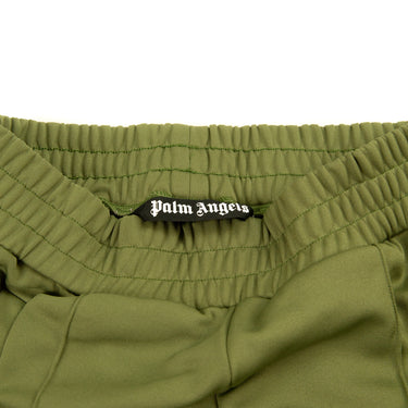The inside label of the Palm Angels Khaki Sweatpants S.