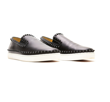 The front of the Christian Louboutin Black Spike Boat Shoes.