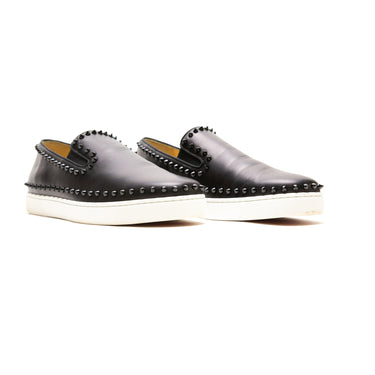 The front of the Christian Louboutin Black Spike Boat Shoes.