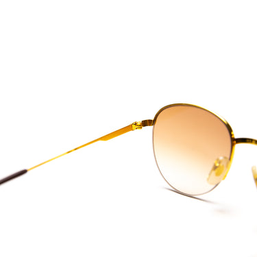 The lens of the Cartier Colisee Sunglasses with Custom Oak Gradient Lenses.