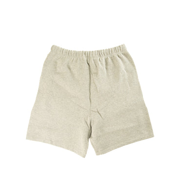 The back of the Fear Of God ESSENTIALS Dark Oatmeal Shorts.
