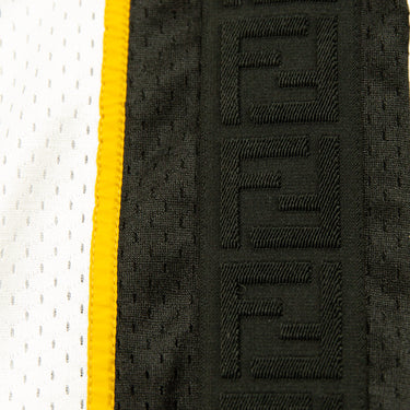 The logo detail of the Fendi  FF Tape Active Mesh Pants.
