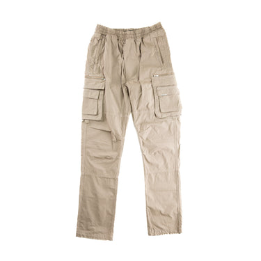 The front of the Represent Beige Cargo Trousers.