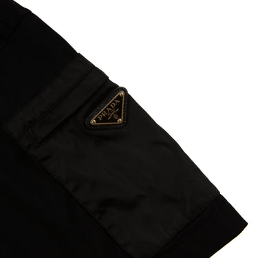 The sleeve logo of the Prada Re-Nylon Black Sleeve Pocket T-Shirt.