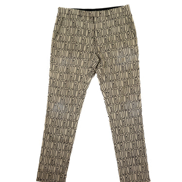 The front view of Dior x Stussy All Over Jeans in beige featuring a cool all-over print.