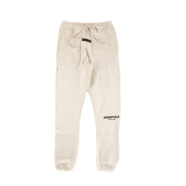 The front of the Fear Of God ESSENTIALS Light Oatmeal Sweatpants.