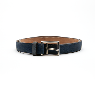 The front of a blue leather Gucci belt.