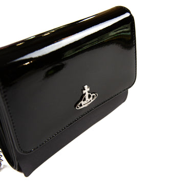 Front side view of a Vivienne Westwood Patent Leather Crossbody Bag in black.