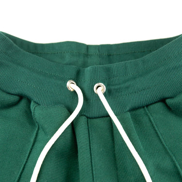 The waistband of the about:blank Green Shorts.