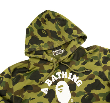 The hood and logo of the A Bathing Ape 1st Camo Green College Hoodie.