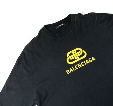 The front of the Balenciaga Yellow BB Logo Black T Shirt.