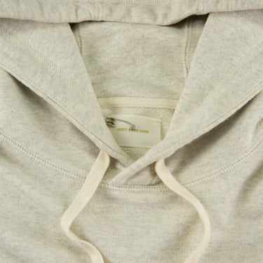 The label of the Aimé Leon Dore Tonal Logo Oatmeal Hoodie.