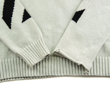 The sleeves of the Off-White Diag Arrows Knit Grey Sweater.