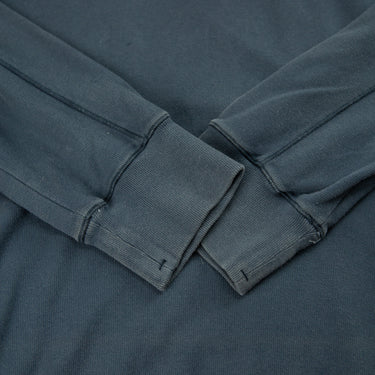 The sleeves of the Stone Island  Navy Lightweight Sweatshirt.