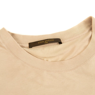 The collar of the Louis Vuitton Crest Logo Beige T Shirt.