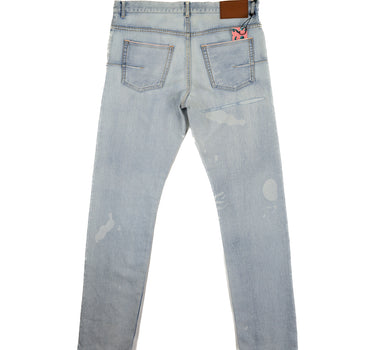 The back of Dior X Kenny Scharf Denim Jeans in blue.