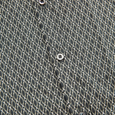 The buttons of the Gucci Long Sleeve Shirt.