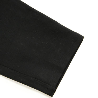 The leg of the Represent Black Cargo Trousers.