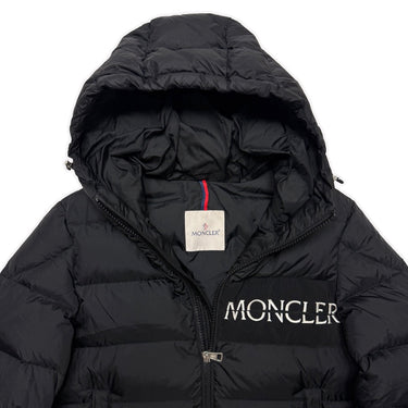 The inside label of the Moncler Aiton Black Puffer Jacket.