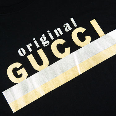 The logo of the Gucci Original Gold Print T Shirt.