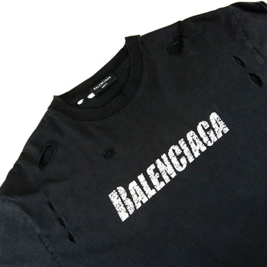 The logo of the Balenciaga Distressed Logo Black T Shirt.