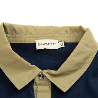 The collar of the Moncler Navy & Beige Polo Shirt.