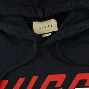 The inside label of the Gucci Geometric Block Logo Hoodie.