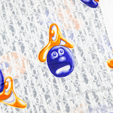 The logo of the Dior x Kenny Scharf Oblique Mesh T Shirt.