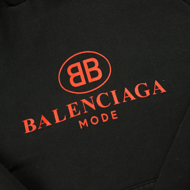 The logo of the Balenciaga Mode Red & Black Hoodie.