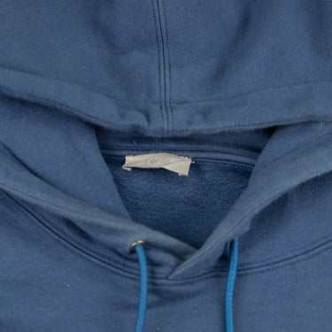 The inside label of the Dior CD Icon Blue Hoodie.