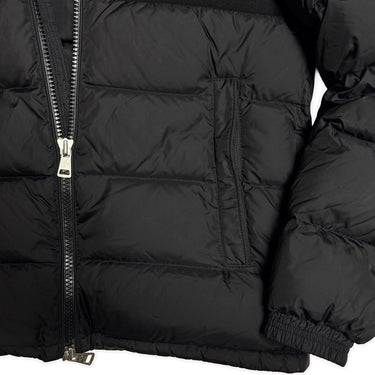 The zip of the Moncler Aiton Black Puffer Jacket.