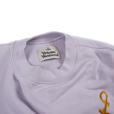 A close-up of the collar on the front of the Vivienne Westwood Lilac Embroidered Sweatshirt.