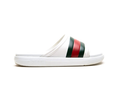 The side of the Gucci Web Rubber White Slide Sandals.