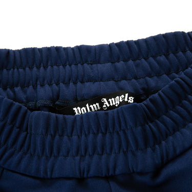 The inside label of the Palm Angels Navy Embroidered Logo Sweatpants.