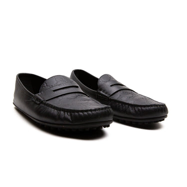 The front of Gucci Black Loafers for men.