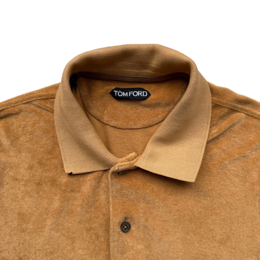 The polo of the Tom Ford Mustard Towelling Polo Shirt.