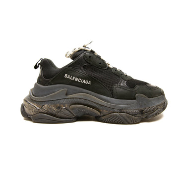 The right of the Balenciaga Black Triple S Trainers.