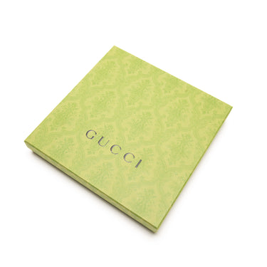 The box of the Gucci Small Dahlia Black Tote Bag.
