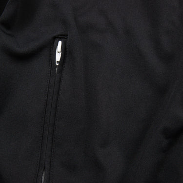 The zip of the Palm Angels Black Track Jacket.