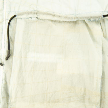 The pocket of the Stone Island Reflective Grid On Lamy-TC Jacket.