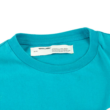 The inside label of the Off-White Tape Arrows Teal T Shirt.
